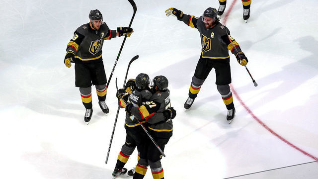 EDMONTON, ALBERTA - SEPTEMBER 04: Shea Theodore #27 of the Vegas Golden Knights is congratulated by his teammates after scoring a goal against the Vancouver Canucks1 during the third period in Game Seven of the Western Conference Second Round during the 2020 NHL Stanley Cup Playoffs at Rogers Place on September 04, 2020 in Edmonton, Alberta, Canada.