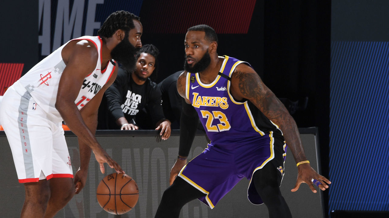 ORLANDO, FL - SEPTEMBER 4: James Harden #13 of the Houston Rockets handles the ball while LeBron James #23 of the Los Angeles Lakers plays defense during Game One of the Western Conference Semifinals of the NBA Playoffs on September 4, 2020 at The AdventHealth Arena at ESPN Wide World Of Sports Complex in Orlando, Florida. NOTE TO USER: User expressly acknowledges and agrees that, by downloading and/or using this Photograph, user is consenting to the terms and conditions of the Getty Images License Agreement. Mandatory Copyright Notice: Copyright 2020 NBAE