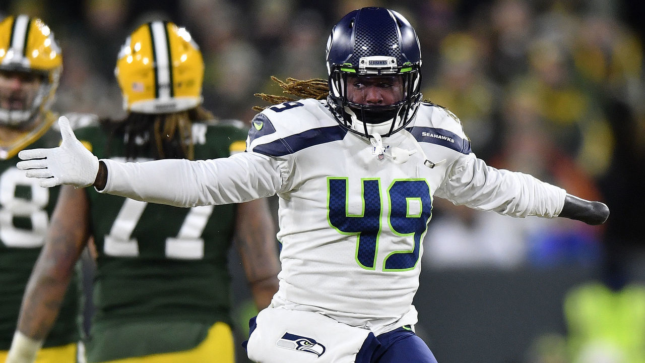 GREEN BAY, WISCONSIN - JANUARY 12: Shaquem Griffin #49 of the Seattle Seahawks celebrates after a sack against Aaron Rodgers #12 (not pictured) of the Green Bay Packers in the second half of the NFC Divisional Playoff game at Lambeau Field on January 12, 2020 in Green Bay, Wisconsin.
