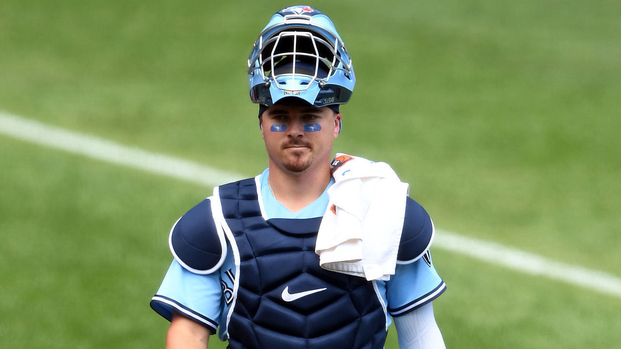 BALTIMORE, MD - AUGUST 19: Reese McGuire #10 of the Toronto Blue Jays walks to the dug out before a baseball game against the Baltimore Orioles at Oriole Park at Camden Yards on August 19, 2020 in Baltimore, Maryland.