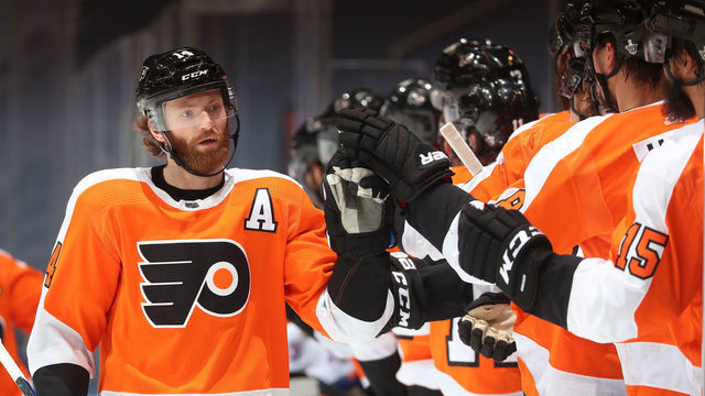 TORONTO, ONTARIO - AUGUST 26: Sean Couturier #14 of the Philadelphia Flyers celebrates with teammates on the bench after scoring in the first period of Game Two of the Eastern Conference Second Round of the 2020 NHL Stanley Cup Playoff between the New York Islanders and the Philadelphia Flyers at Scotiabank Arena on August 26, 2020 in Toronto, Ontario.