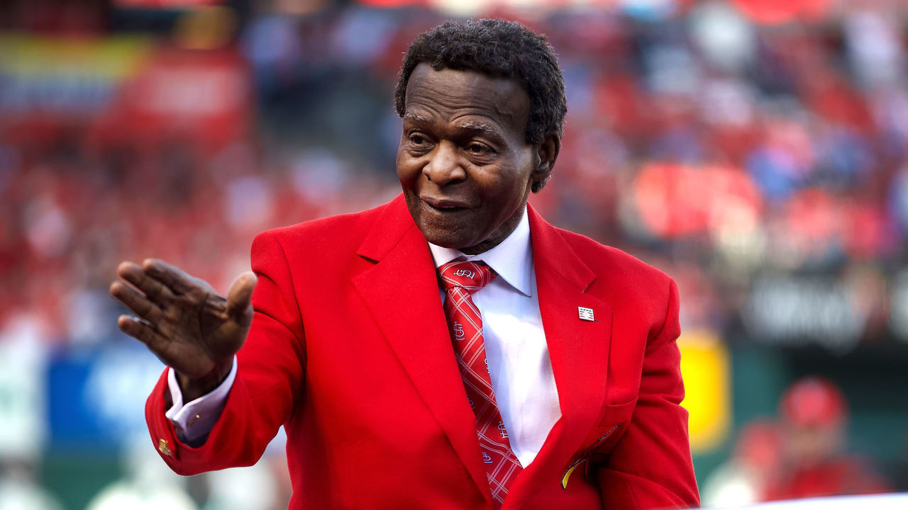 Outfielder Lou Brock of the St. Louis Cardinals with his lead from