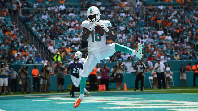 MIAMI, FLORIDA - SEPTEMBER 08: Preston Williams #18 of the Miami Dolphins catches a touchdown against the Baltimore Ravens at Hard Rock Stadium on September 08, 2019 in Miami, Florida.
