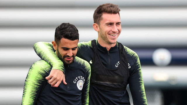 MANCHESTER, ENGLAND - AUGUST 10: Manchester City's Aymeric Laporte and Riyad Mahrez during training at Manchester City Football Academy on August 10, 2018 in Manchester, England.