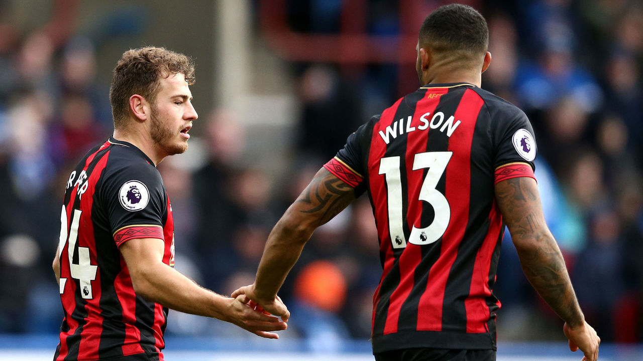 HUDDERSFIELD, ENGLAND - MARCH 09: Ryan Fraser of AFC Bournemouth celebrates after scoring his team's second goal with Callum Wilson of AFC Bournemouth during the Premier League match between Huddersfield Town and AFC Bournemouth at John Smith's Stadium on March 09, 2019 in Huddersfield, United Kingdom.