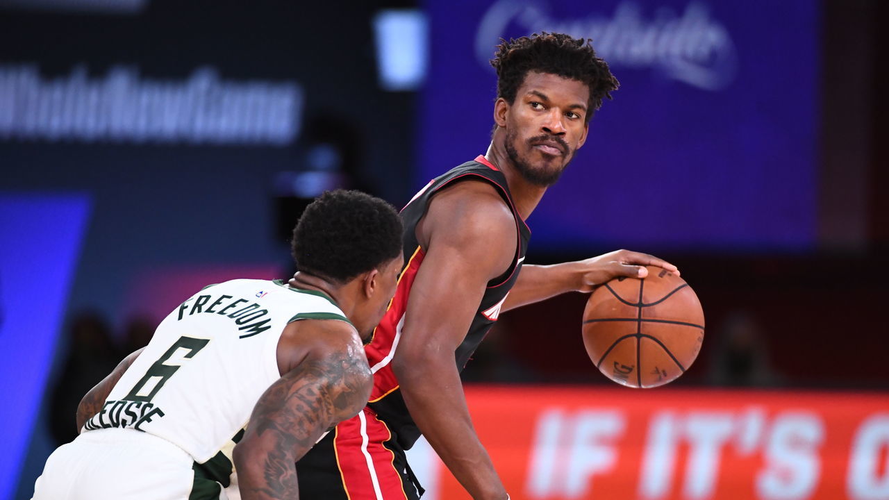 ORLANDO, FL - SEPTEMBER 6: Jimmy Butler #22 of the Miami Heat handles the ball during the game against the Milwaukee Bucks during Game Four of the Eastern Conference Semifinals of the NBA Playoffs on September 6, 2020 at The AdventHealth Arena at ESPN Wide World Of Sports Complex in Orlando, Florida. NOTE TO USER: User expressly acknowledges and agrees that, by downloading and/or using this Photograph, user is consenting to the terms and conditions of the Getty Images License Agreement. Mandatory Copyright Notice: Copyright 2020 NBAE