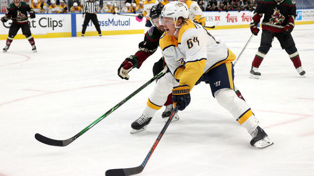 EDMONTON, ALBERTA - AUGUST 07: Mikael Granlund #64 of the Nashville Predators controls the puck away from Derek Stepan #21 of the Arizona Coyotes during the second period of Game Four of the Western Conference Qualification Round at Rogers Place on August 07, 2020 in Edmonton, Alberta.