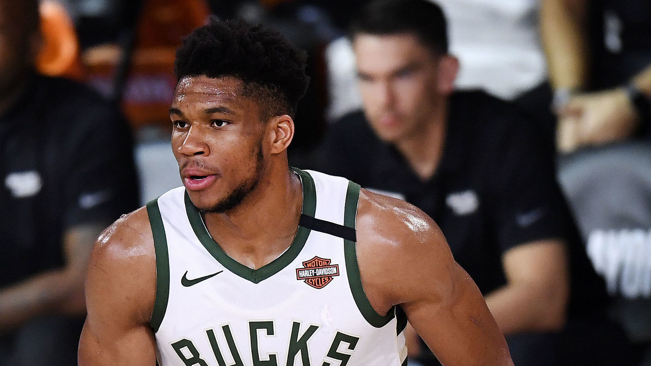LAKE BUENA VISTA, FLORIDA - SEPTEMBER 06: Giannis Antetokounmpo #34 of the Milwaukee Bucks handles the ball during the first quarter against the Miami Heat in Game Four of the Eastern Conference Second Round during the 2020 NBA Playoffs at AdventHealth Arena at the ESPN Wide World Of Sports Complex on September 06, 2020 in Lake Buena Vista, Florida.