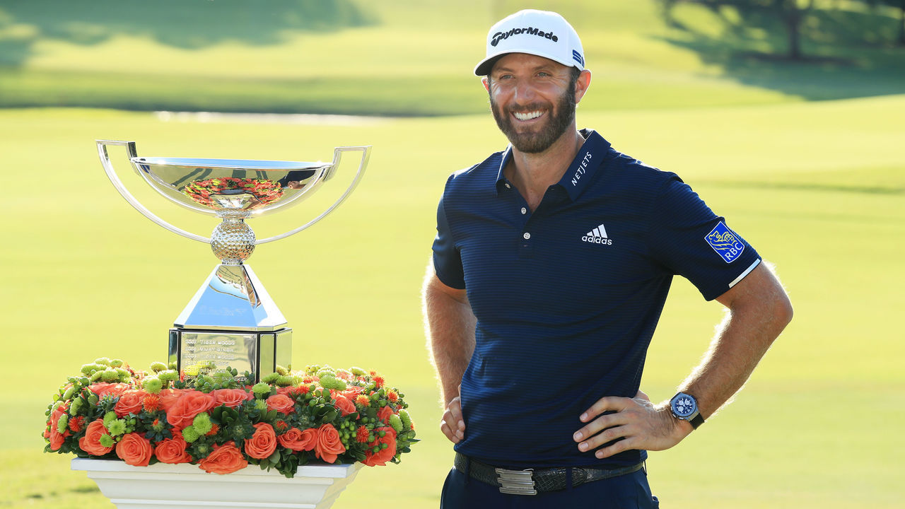 ATLANTA, GEORGIA - SEPTEMBER 07: Dustin Johnson of the United States celebrates with the FedEx Cup Trophy after winning in the final round of the TOUR Championship at East Lake Golf Club on September 07, 2020 in Atlanta, Georgia.