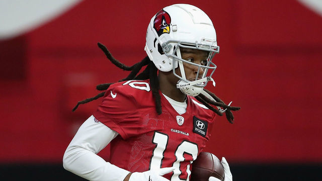 GLENDALE, ARIZONA - AUGUST 25: Wide receiver DeAndre Hopkins #10 of the Arizona Cardinals runs with the football after a reception during a NFL team training camp at State Farm Stadium on August 25, 2020 in Glendale, Arizona.