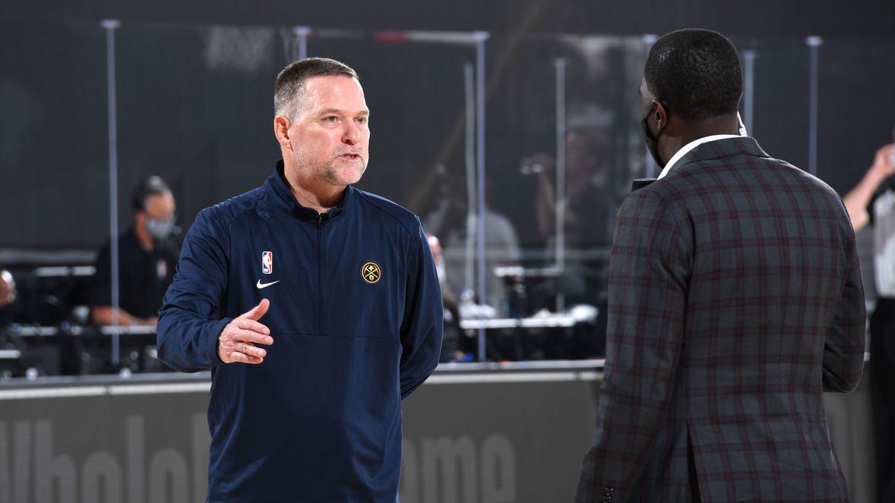 ORLANDO, FL - SEPTEMBER 7: Head coach Michael Malone of the Denver Nuggets talks with the media during Game Three of the Western Conference SemiFinals of the NBA Playoffs on September 7, 2020 at AdventHealth Arena in Orlando, Florida. NOTE TO USER: User expressly acknowledges and agrees that, by downloading and/or using this Photograph, user is consenting to the terms and conditions of the Getty Images License Agreement. Mandatory Copyright Notice: Copyright 2020 NBAE
