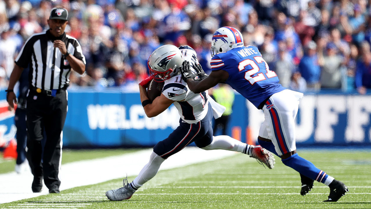 ORCHARD PARK, NEW YORK - SEPTEMBER 29: Julian Edelman #11 of the New England Patriots is pushed out of bounds by Tre'Davious White #27 of the Buffalo Bills during the second quarter at New Era Field on September 29, 2019 in Orchard Park, New York.