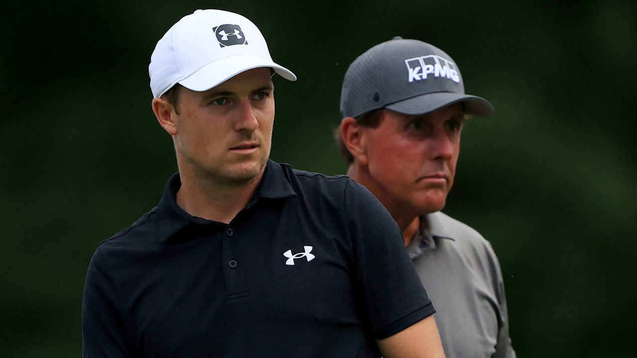DUBLIN, OHIO - JULY 09: Jordan Spieth of the United States and Phil Mickelson of the United States look on from the 18th tee during the first round of the Workday Charity Open on July 09, 2020 at Muirfield Village Golf Club in Dublin, Ohio.