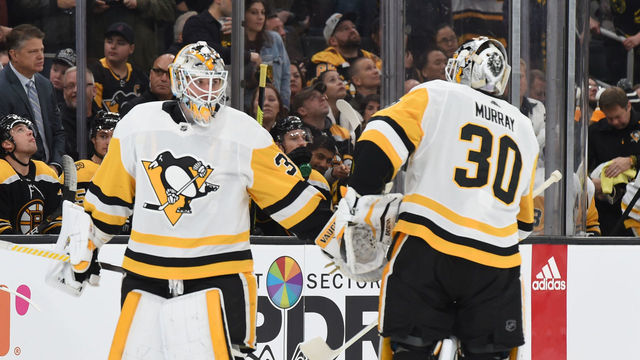 BOSTON, MA - NOVEMBER 4: Tristan Jarry #35 and Matt Murray #30 of the Pittsburgh Penguins swap positions during the second period against the Boston Bruins at the TD Garden on November 4, 2019 in Boston, Massachusetts.