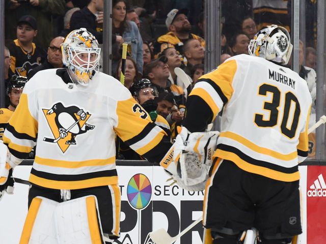 BOSTON, MA - NOVEMBER 4: Tristan Jarry #35 and Matt Murray #30 of the Pittsburgh Penguins swap positions during the second period against the Boston Bruins at the TD Garden on November 4, 2019 in Boston, Massachusetts.