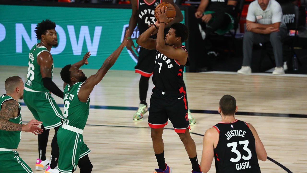 LAKE BUENA VISTA, FLORIDA - SEPTEMBER 09: Kyle Lowry #7 of the Toronto Raptors shoots against Kemba Walker #8 of the Boston Celtics in the second half during Game Six of the second round of the 2020 NBA Playoffs at ESPN Wide World of Sports Complex on September 9, 2020 in Lake Buena Vista, Florida.