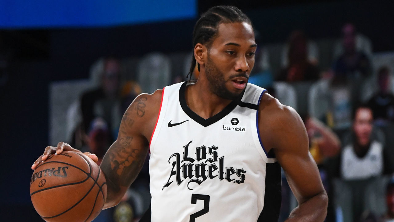 ORLANDO, FL - SEPTEMBER 9: Kawhi Leonard #2 of the LA Clippers handles the ball against the Denver Nuggets during Round Two, Game Four of the Western Conference Semifinals of the NBA Playoffs on September 9, 2020 at the AdventHealth Arena at ESPN Wide World Of Sports Complex in Orlando, Florida. NOTE TO USER: User expressly acknowledges and agrees that, by downloading and/or using this Photograph, user is consenting to the terms and conditions of the Getty Images License Agreement. Mandatory Copyright Notice: Copyright 2020 NBAE