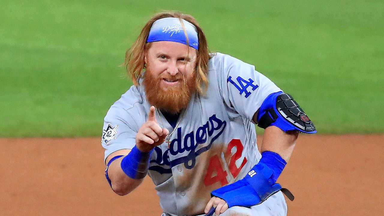 ARLINGTON, TEXAS - AUGUST 28: Justin Turner #42 of the Los Angeles Dodgers reacts after stealing second base against the Texas Rangers in the top of the seventh inning at Globe Life Field on August 28, 2020 in Arlington, Texas. All players are wearing #42 in honor of Jackie Robinson Day. The day honoring Jackie Robinson, traditionally held on April 15, was rescheduled due to the COVID-19 pandemic.”