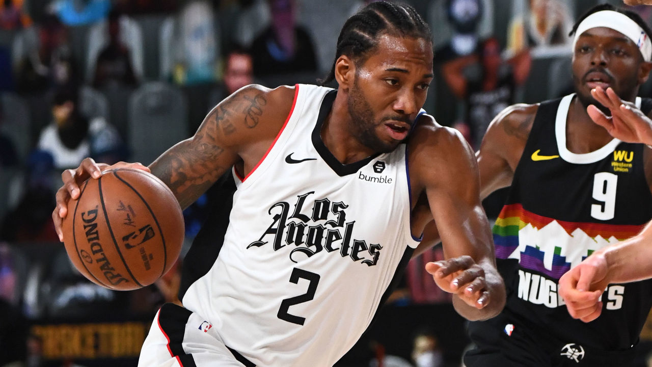 ORLANDO, FL - SEPTEMBER 9: Kawhi Leonard #2 of the LA Clippers handles the ball against the Denver Nuggets during Round Two, Game Four of the Western Conference Semifinals of the NBA Playoffs on September 9, 2020 at the AdventHealth Arena at ESPN Wide World Of Sports Complex in Orlando, Florida. NOTE TO USER: User expressly acknowledges and agrees that, by downloading and/or using this Photograph, user is consenting to the terms and conditions of the Getty Images License Agreement. Mandatory Copyright Notice: Copyright 2020 NBAE