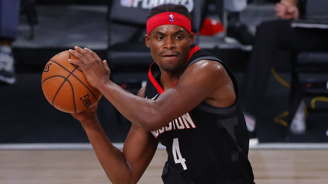LAKE BUENA VISTA, FLORIDA - AUGUST 24: Danuel House Jr. #4 of the Houston Rockets passes against Chris Paul #3 of the Oklahoma City Thunder during the first quarter in Game Four of the Western Conference First Round during the 2020 NBA Playoffs at AdventHealth Arena at ESPN Wide World Of Sports Complex on August 24, 2020 in Lake Buena Vista, Florida.