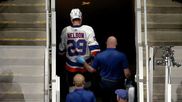 EDMONTON, ALBERTA - SEPTEMBER 09: Brock Nelson #29 of the New York Islanders is taken off the ice by the trainer after sustaining an injury on a boarding penalty by Alex Killorn (not pictured) of the Tampa Bay Lightning during the first period in Game Two of the Eastern Conference Final during the 2020 NHL Stanley Cup Playoffs at Rogers Place on September 09, 2020 in Edmonton, Alberta, Canada.