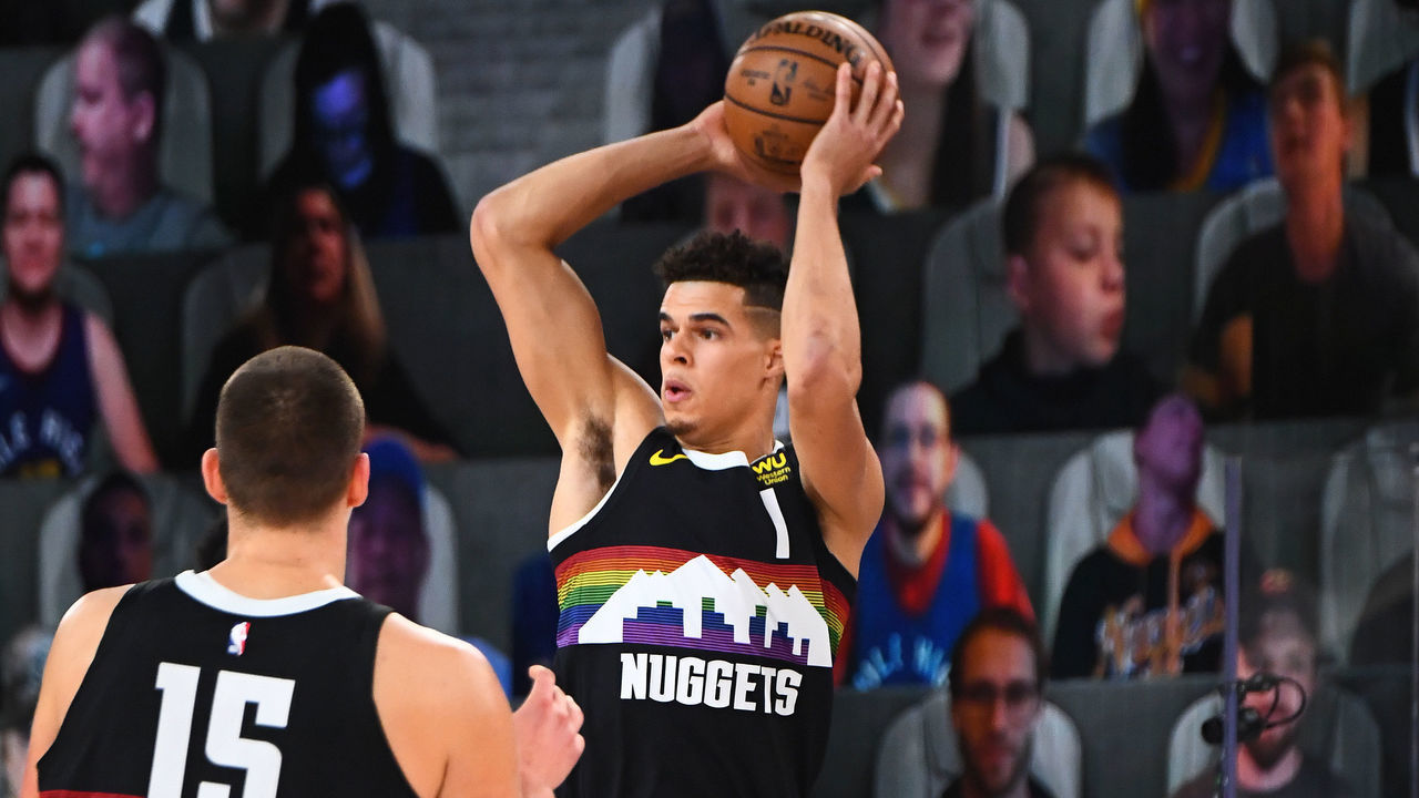 ORLANDO, FL - SEPTEMBER 7: Michael Porter Jr. #1 of the Denver Nuggets passes the ball against the LA Clippers during Round Two, Game Three of the Western Conference Semifinals on September 7, 2020 at the AdventHealth Arena at ESPN Wide World Of Sports Complex in Orlando, Florida. NOTE TO USER: User expressly acknowledges and agrees that, by downloading and/or using this Photograph, user is consenting to the terms and conditions of the Getty Images License Agreement. Mandatory Copyright Notice: Copyright 2020 NBAE
