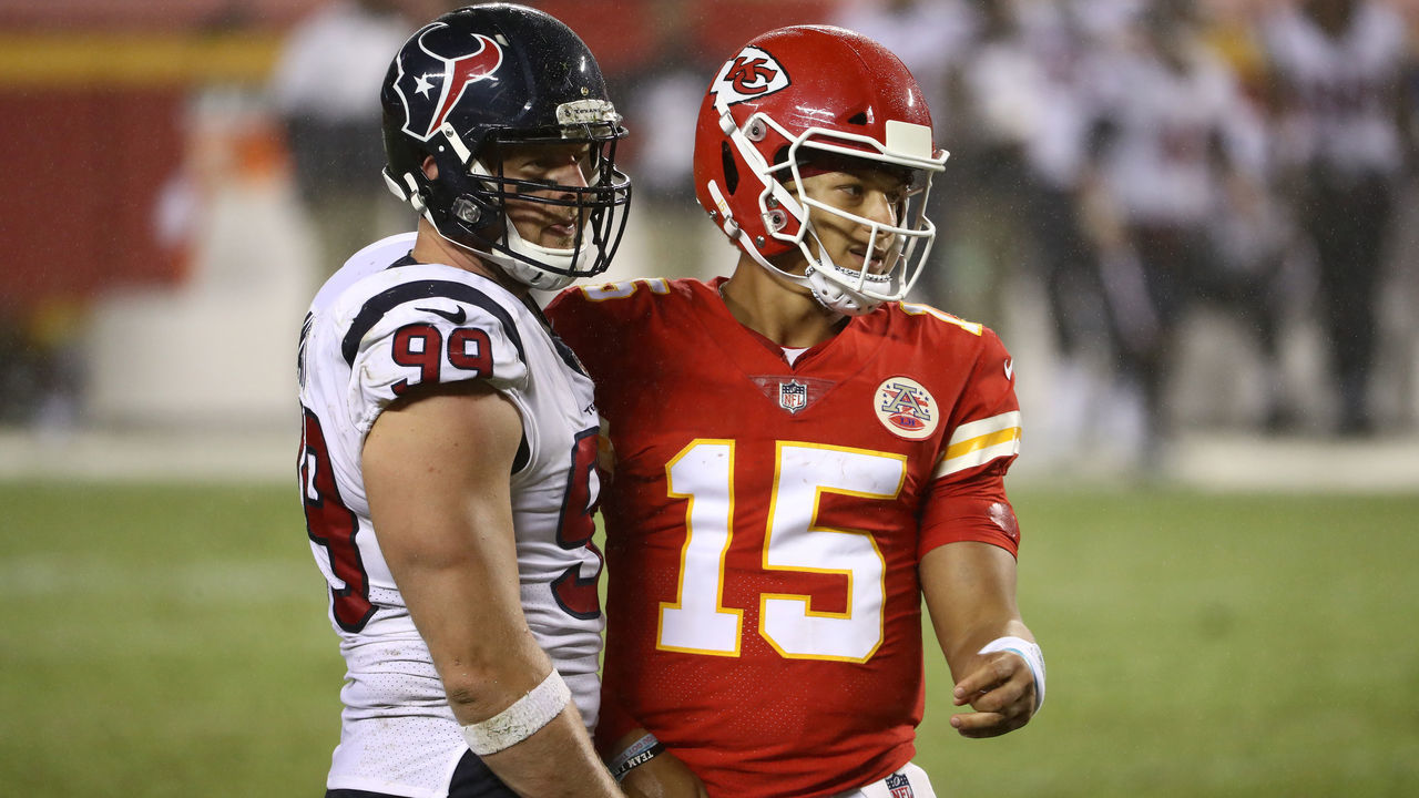 KANSAS CITY, MISSOURI - SEPTEMBER 10: Patrick Mahomes #15 of the Kansas City Chiefs and J.J. Watt #99 of the Houston Texans stand together during the fourth quarter at Arrowhead Stadium on September 10, 2020 in Kansas City, Missouri.