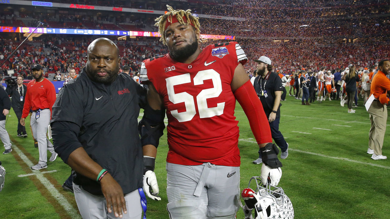 GLENDALE, ARIZONA - DECEMBER 28: Offensive lineman Wyatt Davis #52 of the Ohio State Buckeyes walks off the field after his teams 29-23 loss to the Clemson Tigers in the College Football Playoff Semifinal at the PlayStation Fiesta Bowl at State Farm Stadium on December 28, 2019 in Glendale, Arizona.