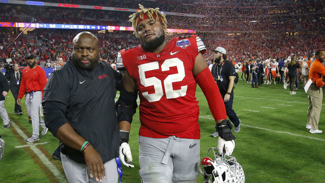 GLENDALE, ARIZONA - DECEMBER 28: Offensive lineman Wyatt Davis #52 of the Ohio State Buckeyes walks off the field after his teams 29-23 loss to the Clemson Tigers in the College Football Playoff Semifinal at the PlayStation Fiesta Bowl at State Farm Stadium on December 28, 2019 in Glendale, Arizona.