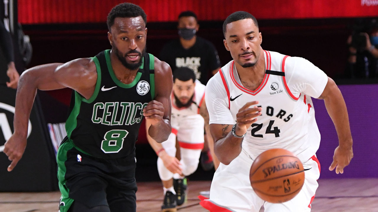 ORLANDO, FL - SEPTEMBER 11: Kemba Walker #8 of the Boston Celtics and Norman Powell #24 of the Toronto Raptors runs to grab the loose ball during Game Seven of the Eastern Conference SemiFinals of the NBA Playoffs on September 11, 2020 at AdventHealth Arena in Orlando, Florida. NOTE TO USER: User expressly acknowledges and agrees that, by downloading and/or using this Photograph, user is consenting to the terms and conditions of the Getty Images License Agreement. Mandatory Copyright Notice: Copyright 2020 NBAE