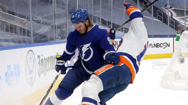 EDMONTON, ALBERTA - SEPTEMBER 09: Mikhail Sergachev #98 of the Tampa Bay Lightning holds off a check by Matt Martin #17 of the New York Islanders in the second period of Game Two of the Eastern Conference Final of the 2020 NHL Stanley Cup Playoffs between the New York Islanders and the Tampa Bay Lightning at Rogers Place on September 09, 2020 in Edmonton, Alberta.