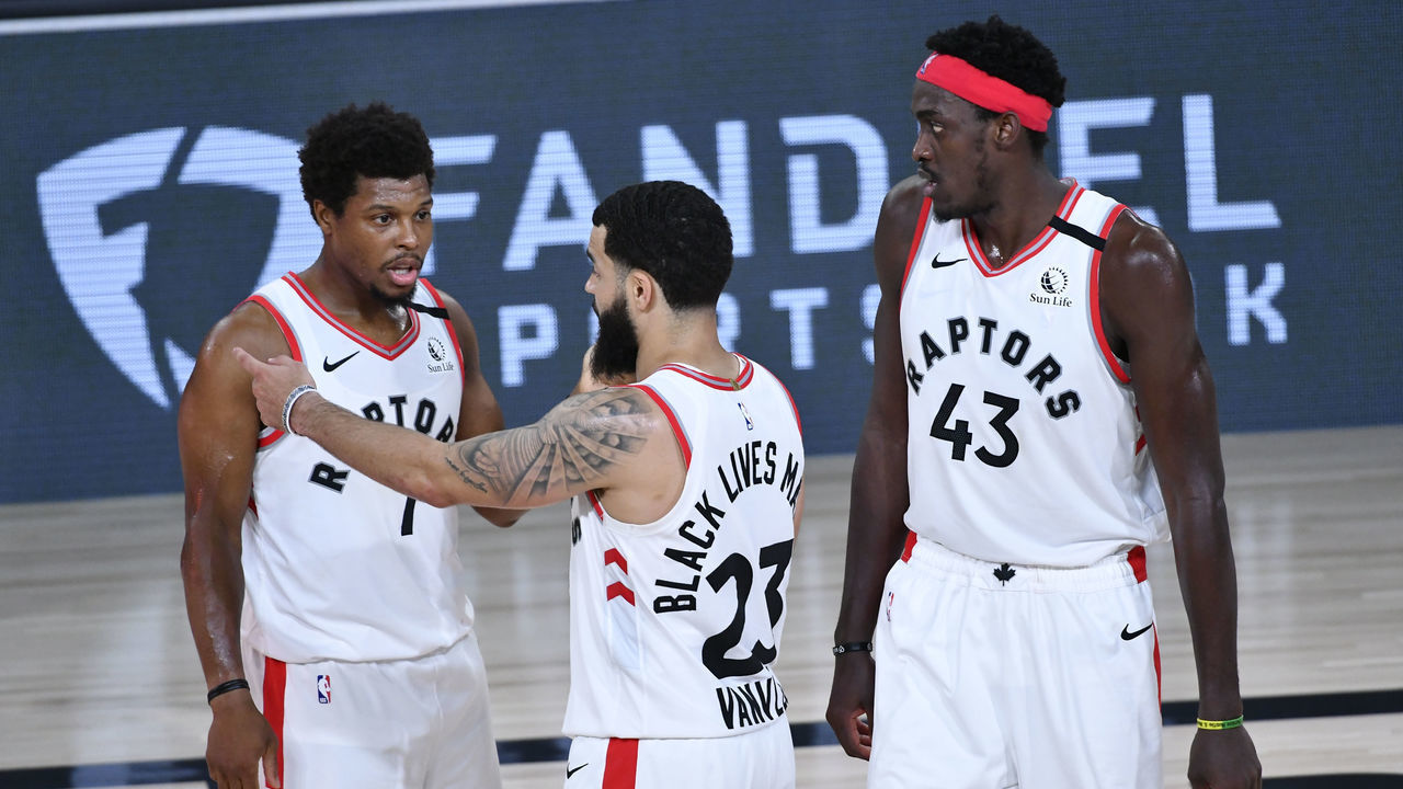 Orlando, FL - SEPTEMBER 11: Kyle Lowry #7 and Fred VanVleet #23 of the Toronto Raptors talk during the game against the Boston Celtics during Game Seven of the Eastern Conference Semifinals on September 11, 2020 in Orlando, Florida at AdventHealth Arena. NOTE TO USER: User expressly acknowledges and agrees that, by downloading and/or using this Photograph, user is consenting to the terms and conditions of the Getty Images License Agreement. Mandatory Copyright Notice: Copyright 2020 NBAE