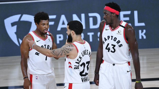 Orlando, FL - SEPTEMBER 11: Kyle Lowry #7 and Fred VanVleet #23 of the Toronto Raptors talk during the game against the Boston Celtics during Game Seven of the Eastern Conference Semifinals on September 11, 2020 in Orlando, Florida at AdventHealth Arena. NOTE TO USER: User expressly acknowledges and agrees that, by downloading and/or using this Photograph, user is consenting to the terms and conditions of the Getty Images License Agreement. Mandatory Copyright Notice: Copyright 2020 NBAE