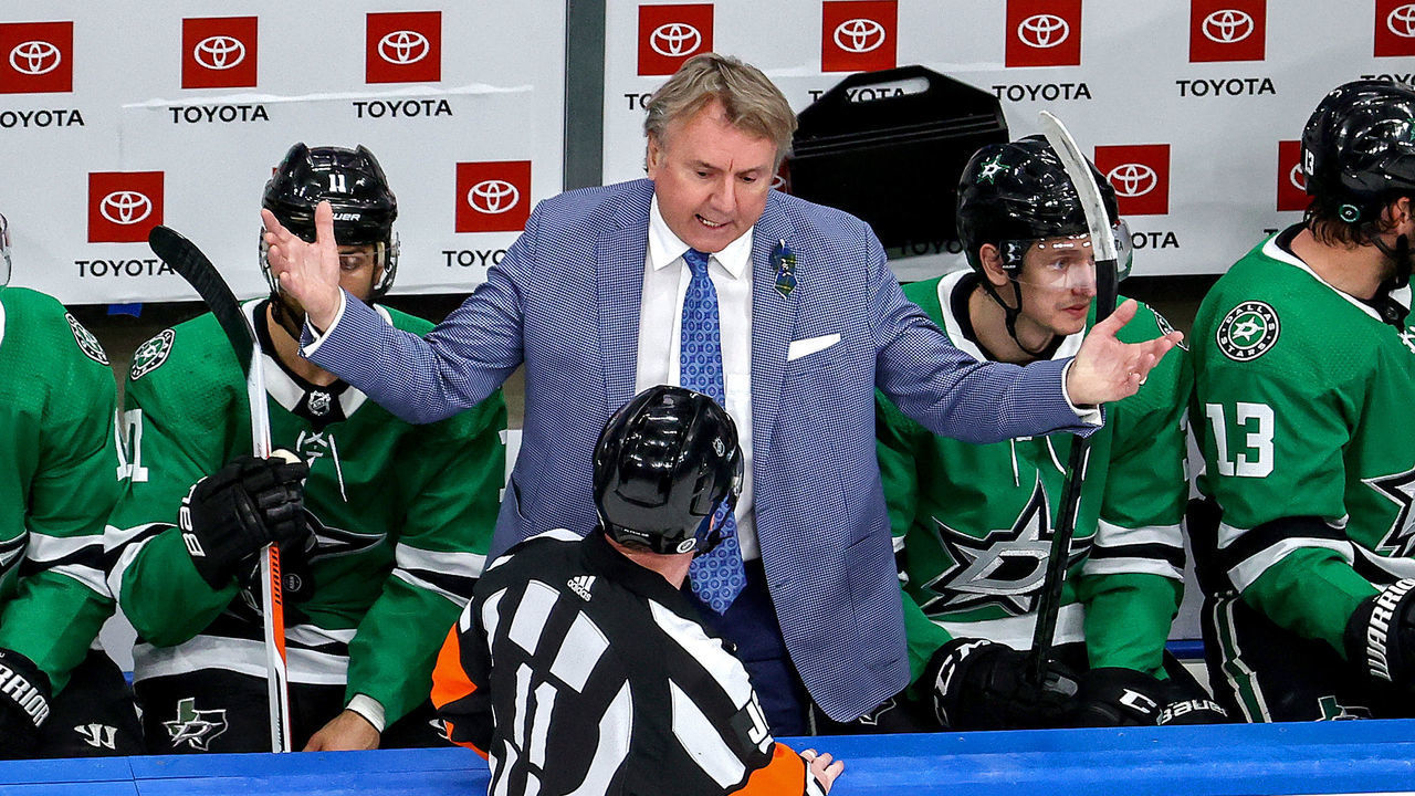 EDMONTON, ALBERTA - AUGUST 30: Head coach Rick Bowness of the Dallas Stars argues with referee Kelly Sutherland #11 during the second period in Game Four of the Western Conference Second Round against the Colorado Avalanche during the 2020 NHL Stanley Cup Playoffs at Rogers Place on August 30, 2020 in Edmonton, Alberta, Canada.