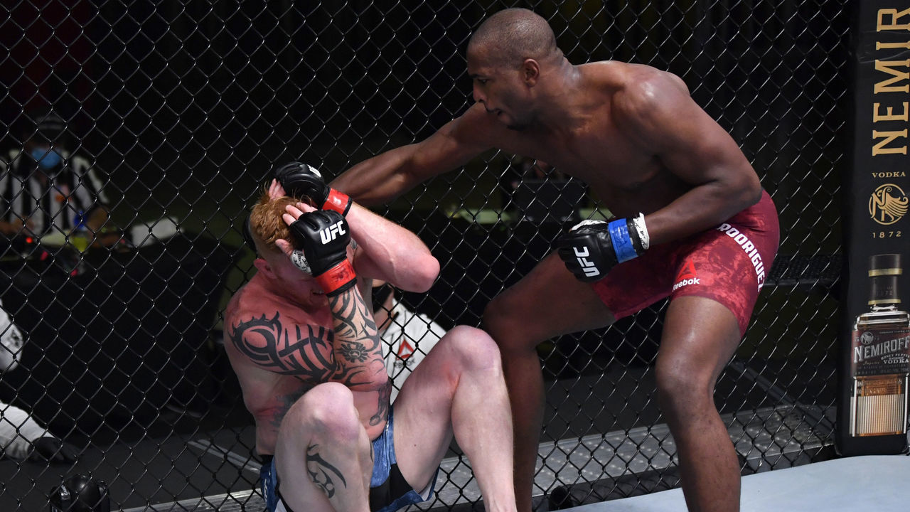 LAS VEGAS, NEVADA - SEPTEMBER 12: (R-L) Mike Rodriguez punches Ed Herman in a light heavyweight fight during the UFC Fight Night event at UFC APEX on September 12, 2020 in Las Vegas, Nevada.