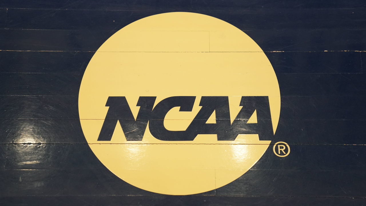 WASHINGTON, DC - MARCH 03: The NCAA logo on the floor during a Atlantic 10 Women's Basketball Tournament - First Round college basketball game between the Richmond Spiders and the George Washington Colonials at the Smith Center on March 3, 2020 in Washington, DC.