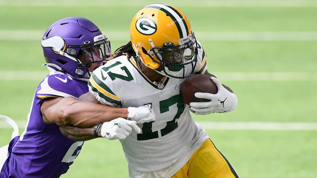 MINNEAPOLIS, MINNESOTA - SEPTEMBER 13: Mike Hughes #21 of the Minnesota Vikings pushes Davante Adams #17 of the Green Bay Packers out of bounds during the second quarter of the game at U.S. Bank Stadium on September 13, 2020 in Minneapolis, Minnesota.
