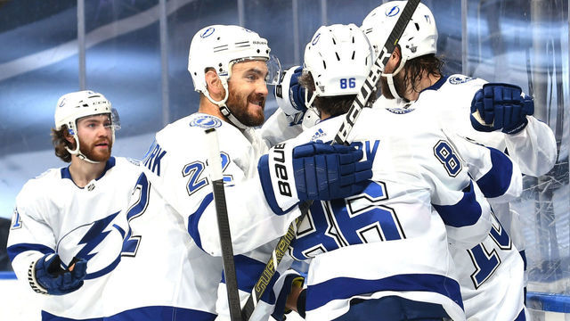 EDMONTON, ALBERTA - SEPTEMBER 13: Ondrej Palat #18 of the Tampa Bay Lightning celebrates with Brayden Point #21, Victor Hedman #77, Kevin Shattenkirk #22 and Nikita Kucherov #86 after Palat scored in the second period of Game Four of the Eastern Conference Final of the 2020 NHL Stanley Cup Playoffs between the Tampa Bay Lightning and the New York Islanders at Rogers Place on September 13, 2020 in Edmonton, Alberta.