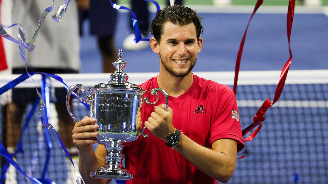 NEW YORK, NEW YORK - SEPTEMBER 13: Dominic Thiem of Austria celebrates with the championship trophy after winning in a tie-breaker during his Men's Singles final match against Alexander Zverev of Germany on Day Fourteen of the 2020 US Open at the USTA Billie Jean King National Tennis Center on September 13, 2020 in the Queens borough of New York City.