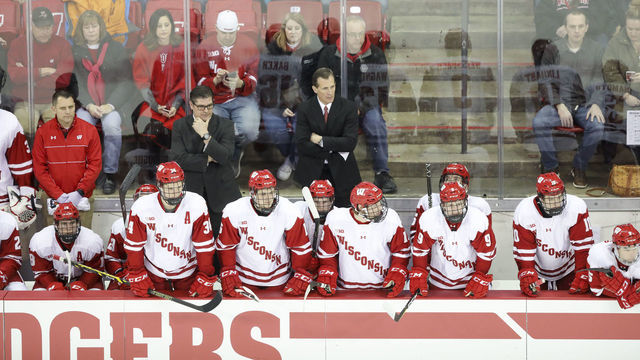 MADISON, WI - JANUARY 13: Wisconsin head coach Tony Granato and the Wisconsin bench watch the action during a college hockey match between the University of Wisconsin Badgers and the Michigan State University Spartans on January 13, 2018 at the Kohl Center in Madison, WI.