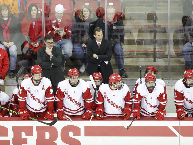 MADISON, WI - JANUARY 13: Wisconsin head coach Tony Granato and the Wisconsin bench watch the action during a college hockey match between the University of Wisconsin Badgers and the Michigan State University Spartans on January 13, 2018 at the Kohl Center in Madison, WI.