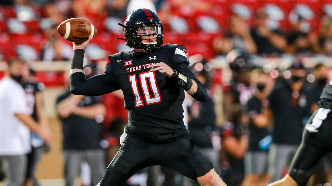 LUBBOCK, TEXAS - SEPTEMBER 12: Quarterback Alan Bowman #10 of the Texas Tech Red Raiders passes the ball during the first half of the college football game against the Houston Baptist Huskies on September 12, 2020 at Jones AT&T Stadium in Lubbock, Texas.