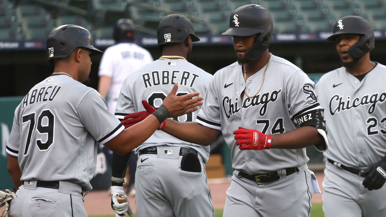 DETROIT, MICHIGAN - AUGUST 11: Eloy Jimenez #74 of the Chicago White Sox celebrates his first inning three run home run with Jose Abreu #79 while playing the Detroit Tigers at Comerica Park on August 11, 2020 in Detroit, Michigan.