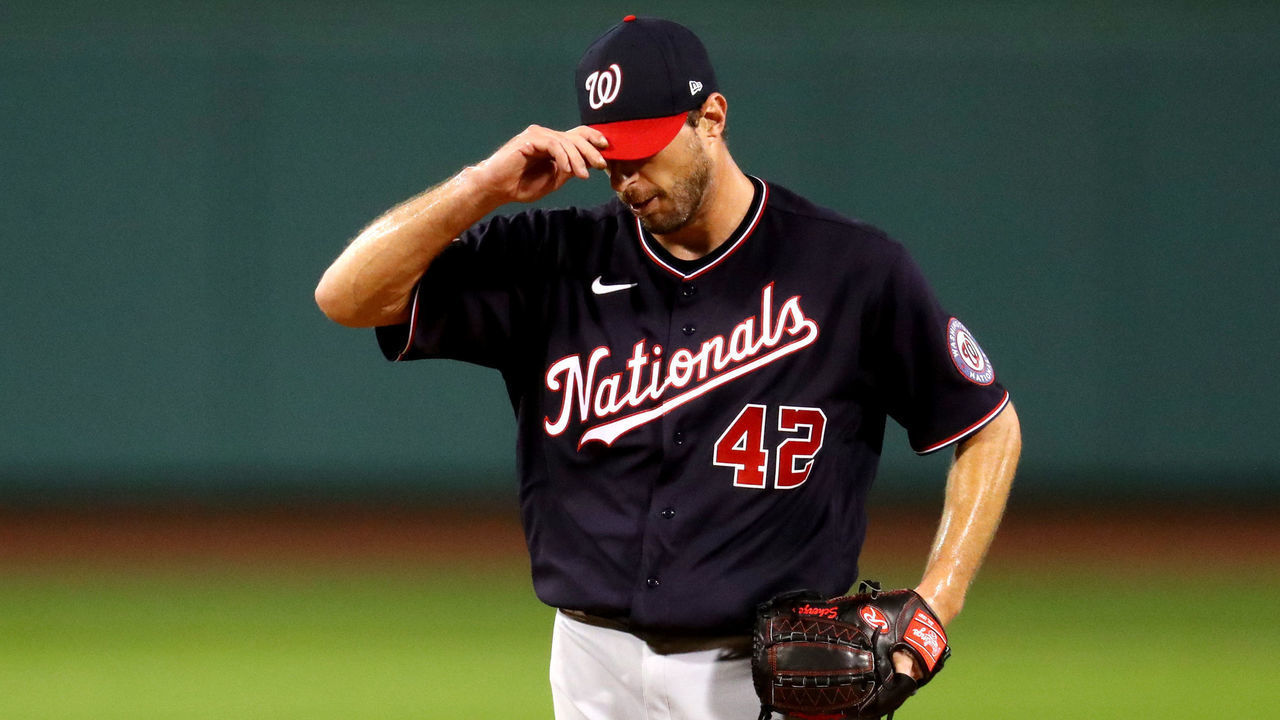 BOSTON, MASSACHUSETTS - AUGUST 28: Max Scherzer #42 of the Washington Nationals looks on during the third inning of the game against the Boston Red Sox at Fenway Park on August 28, 2020 in Boston, Massachusetts. All players are wearing #42 in honor of Jackie Robinson Day. The day honoring Jackie Robinson, traditionally held on April 15, was rescheduled due to the COVID-19 pandemic.