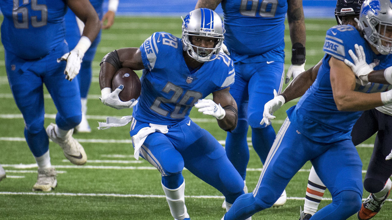 DETROIT, MI - SEPTEMBER 13: Adrian Peterson #28 of the Detroit Lions runs the ball during the first quarter against the Chicago Bears at Ford Field on September 13, 2020 in Detroit, Michigan.