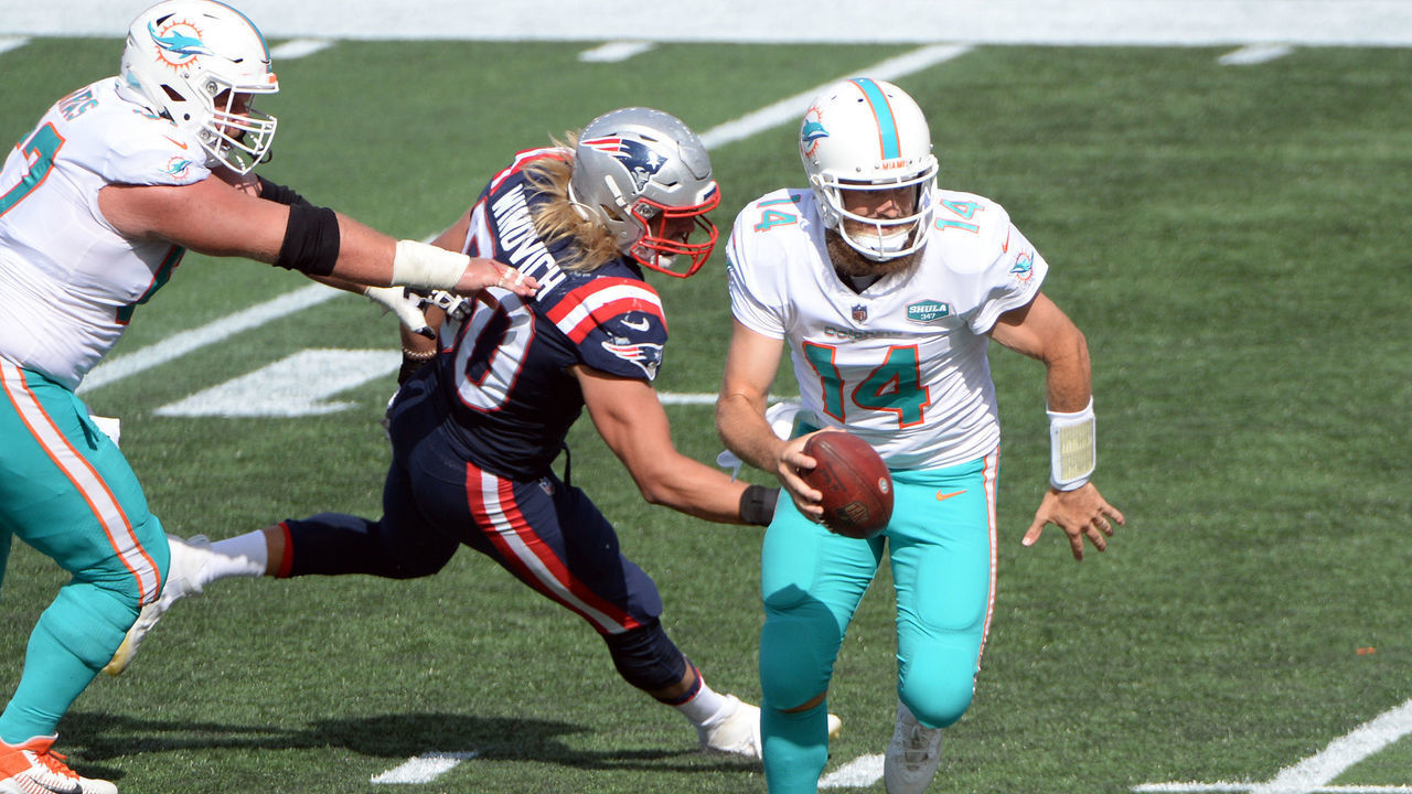 FOXBOROUGH, MASSACHUSETTS - SEPTEMBER 13: Ryan Fitzpatrick #14 of the Miami Dolphins runs with the ball during the second half against the New England Patriots at Gillette Stadium on September 13, 2020 in Foxborough, Massachusetts.