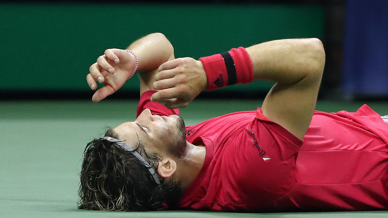 NEW YORK, NEW YORK - SEPTEMBER 13: Dominic Thiem of Austria lays down in celebration after winning championship point after a tie-break during his Men's Singles final match against and Alexander Zverev of Germany on Day Fourteen of the 2020 US Open at the USTA Billie Jean King National Tennis Center on September 13, 2020 in the Queens borough of New York City.