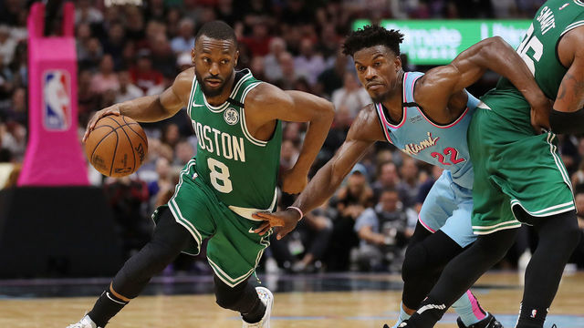 MIAMI, FLORIDA - JANUARY 28: Kemba Walker #8 of the Boston Celtics drives to the basket against Jimmy Butler #22 of the Miami Heat during the second half at American Airlines Arena on January 28, 2020 in Miami, Florida. NOTE TO USER: User expressly acknowledges and agrees that, by downloading and/or using this photograph, user is consenting to the terms and conditions of the Getty Images License Agreement.