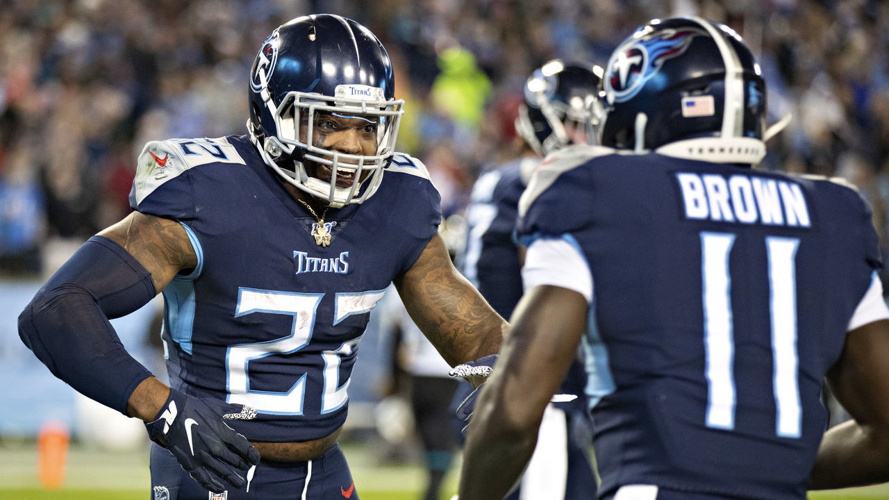 NASHVILLE, TN - NOVEMBER 24: Derrick Henry #22 celebrates after a touchdown by A.J. Brown #11 of the Tennessee Titans during the second half of a game against the Jacksonville Jaguars at Nissan Stadium on November 24, 2019 in Nashville, Tennessee. The Titans defeated the Jaguars 42-20.