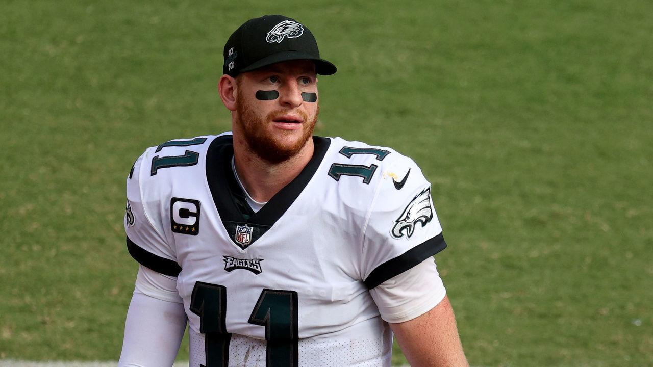 LANDOVER, MARYLAND - SEPTEMBER 13: Quarterback Carson Wentz #11 of the Philadelphia Eagles walks of the field following the Eagles lose to the Washington Football Team at FedExField on September 13, 2020 in Landover, Maryland.